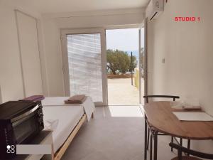 Televízia a/alebo spoločenská miestnosť v ubytovaní WelcomE + 7 fotografií