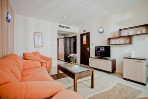 TV a/nebo společenská místnost v ubytování Selena Hotel
