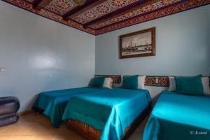 Cama o camas de una habitación en Hotel Chams