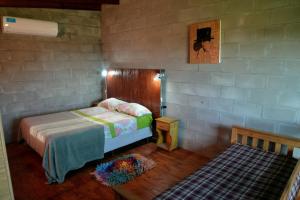 Ένα ή περισσότερα κρεβάτια σε δωμάτιο στο Campo Akal