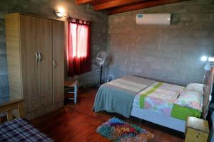 En eller flere senge i et værelse på Campo Akal