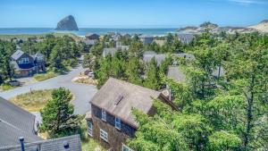 an aerial view of a house and the ocean at Nautical by Nature in Pacific City