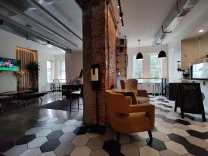 TV a/nebo společenská místnost v ubytování U Street Capsule Hostel