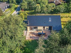 una vista aérea de una casa con techo azul en 10 person holiday home in V ggerl se, en Bøtø By