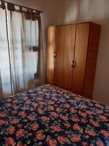 Säng eller sängar i ett rum på El Nevado Casa de Campo