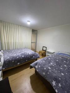 Ένα ή περισσότερα κρεβάτια σε δωμάτιο στο Casa 1er piso D&C