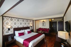 Postel nebo postele na pokoji v ubytování Denzong Regency- Luxury Mountain Retreat Spa & Casino