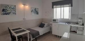 Kuchyň nebo kuchyňský kout v ubytování Hostal Nevada