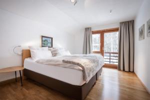 Posteľ alebo postele v izbe v ubytovaní Chalet Berghof