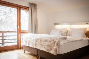 Posteľ alebo postele v izbe v ubytovaní Chalet Berghof