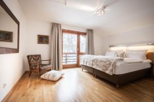 Posteľ alebo postele v izbe v ubytovaní Chalet Berghof