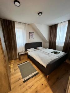 Postel nebo postele na pokoji v ubytování Apartmán JUH