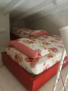 Postel nebo postele na pokoji v ubytování Residence PEGA B&B