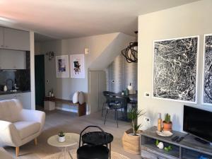 TV a/nebo společenská místnost v ubytování Casa Alexa