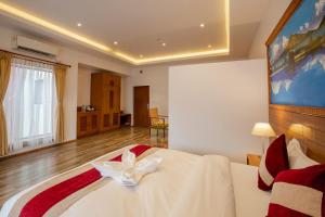 A bed or beds in a room at Manigram Bishram Batika Pvt Ltd