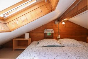 Katil atau katil-katil dalam bilik di Le Chalet du Petit Ours