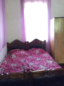 Ένα ή περισσότερα κρεβάτια σε δωμάτιο στο Gunter Guest house
