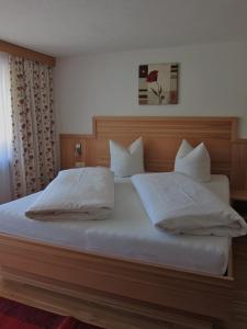 Ένα ή περισσότερα κρεβάτια σε δωμάτιο στο Haus Elisabeth