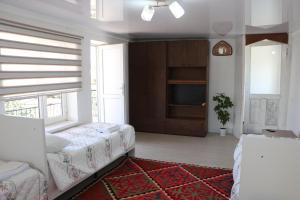 Afbeelding uit fotogalerij van Guest House Akbermet in Bokonbayevo