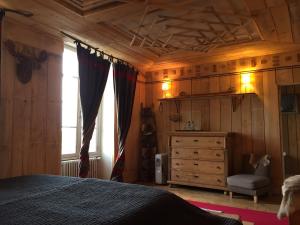 Postel nebo postele na pokoji v ubytování Comptoir d aubrac