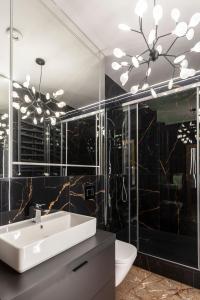 Koupelna v ubytování Apartamenty Przy Plaży Klif + 70 fotografií