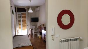 a room with a sink and a mirror on the wall at Bed & Breakfast - Day Use one in Polla