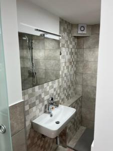 Koupelna v ubytování Apartma ELA + 12 fotografií