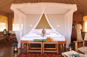 Ένα ή περισσότερα κρεβάτια σε δωμάτιο στο Severin Safari Camp +37 φωτογραφίες