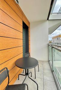 Balkon lub taras w obiekcie Modern Green Apartment