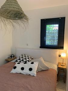 Postel nebo postele na pokoji v ubytování Agapi home + 13 fotografií