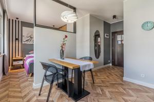Posteľ alebo postele v izbe v ubytovaní Lead Apartment