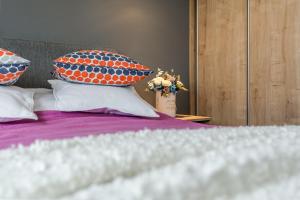 Posteľ alebo postele v izbe v ubytovaní Lead Apartment
