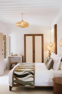 Postel nebo postele na pokoji v ubytování Riad Nyla Wellness and Spa