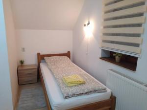 Postel nebo postele na pokoji v ubytování Vila Žubor + 35 fotografií
