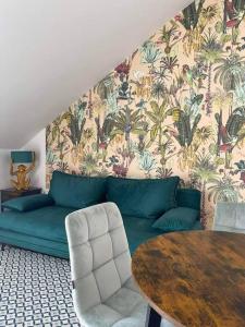 A seating area at Fit Paradise Apartman