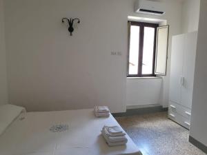 A bed or beds in a room at Il Gaza