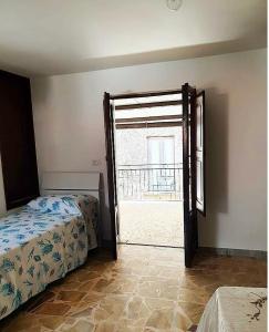 A bed or beds in a room at Il Gaza