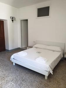 A bed or beds in a room at Il Gaza