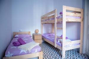 Postel nebo postele na pokoji v ubytování Hauzify I Apartament Can Missé