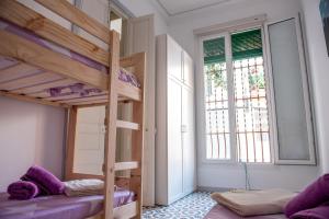 Postel nebo postele na pokoji v ubytování Hauzify I Apartament Can Missé