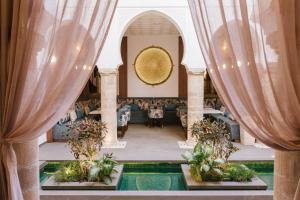 Bazén v ubytování Riad Nyla Wellness and Spa nebo v jeho okolí