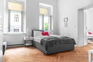 Łóżko lub łóżka w pokoju w obiekcie Classy 2BR Apt. w/ Exclusive Location near AKH