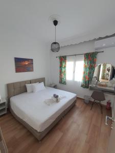 Łóżko lub łóżka w pokoju w obiekcie Villa Fer Forze you have the feeling of your own holiday home
