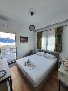 Łóżko lub łóżka w pokoju w obiekcie Villa Fer Forze you have the feeling of your own holiday home