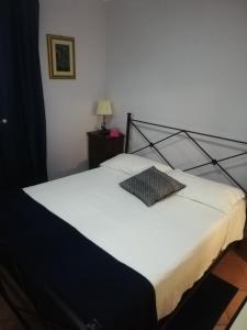 Una cama o camas en una habitación de Borgo Antico