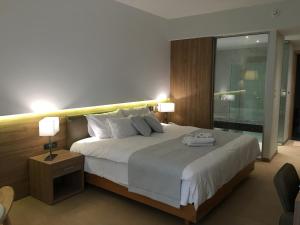 Letto o letti in una camera di Calypso Palace