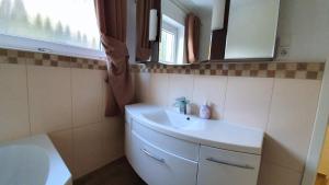 Ванна кімната в City Apartment Hanau