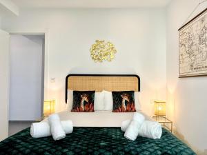 Voodi või voodid majutusasutuse Malagueta beach I & Private Terrace by ELE Apartments toas