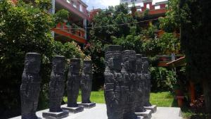 Κήπος έξω από το Hotel Posada Tolteca