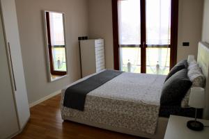 Postel nebo postele na pokoji v ubytování Rho Fiera Milano - Popy House